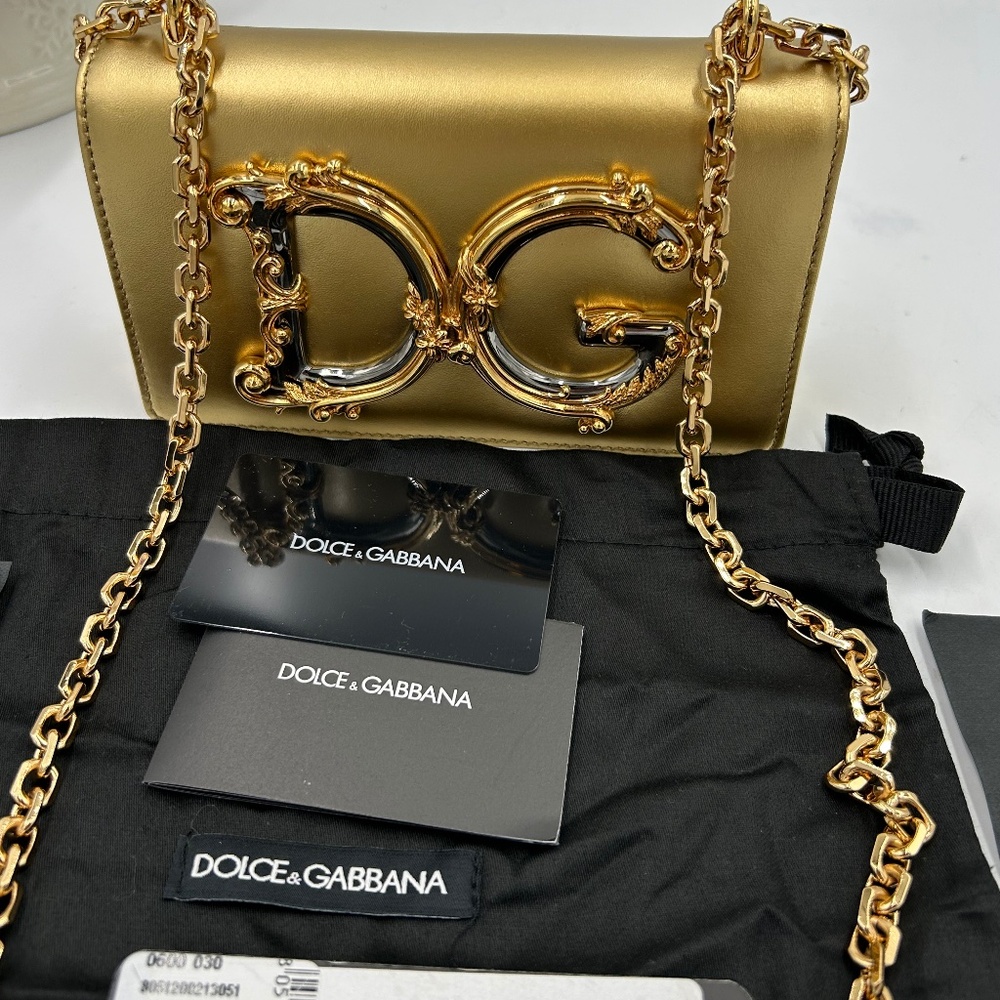 Women’s Dolce& Gabbana DG girls metallic gold Crossbody bag made in Italy.